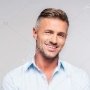 depositphotos_220729084-stock-photo-smiling-adult-man-crossed-arms