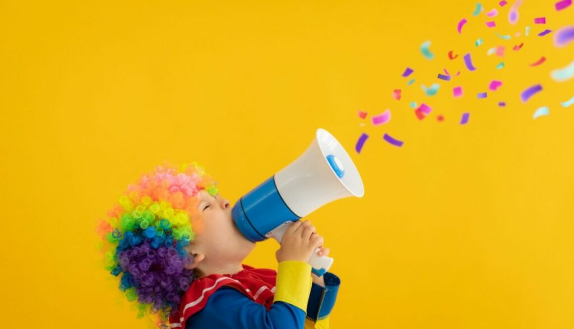 Kid clown playing in the daycare room