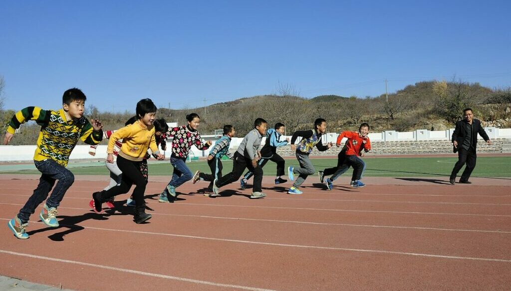 Boys running on the playground