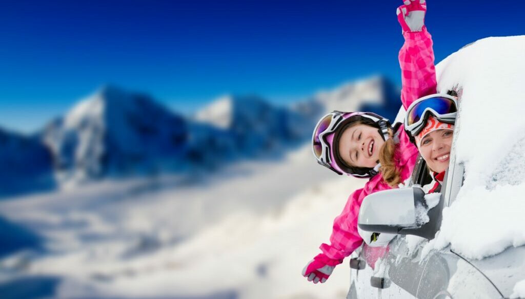 Happy family on the road for ski holidays