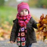 Daycare baby in an autumn park